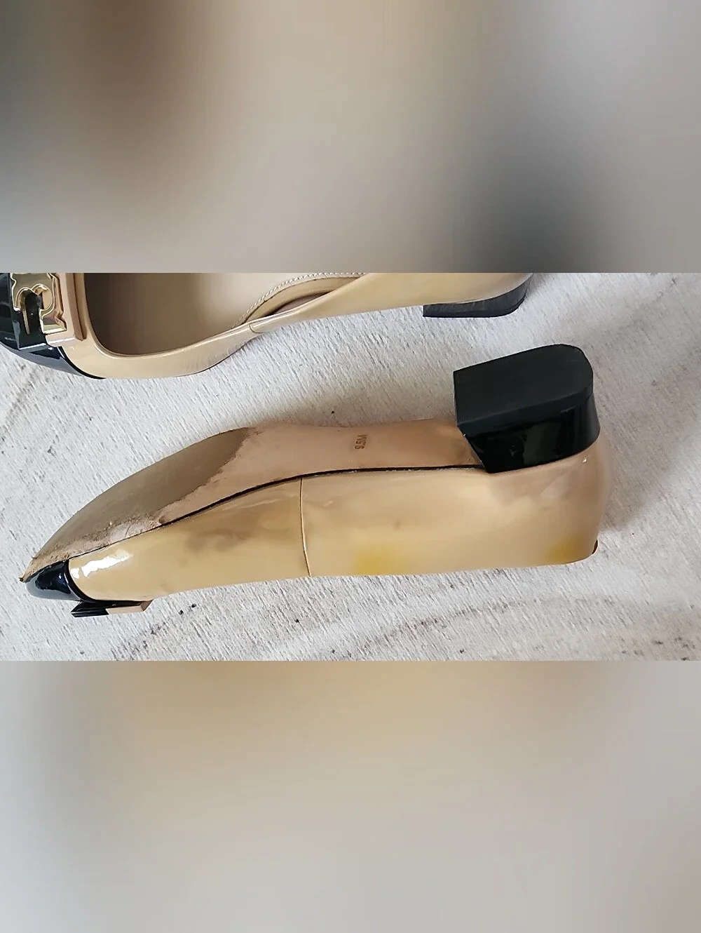 Two-Tone Beige and Black Cap-Toe Ballet Flats with Gold Accent